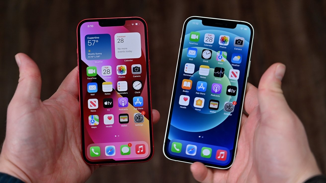 iPhone 13 and iPhone 12 in hand